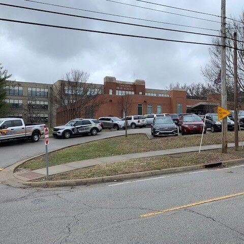 Police vehicles outside Eastern High School after gun found there on Jan. 23, 2023